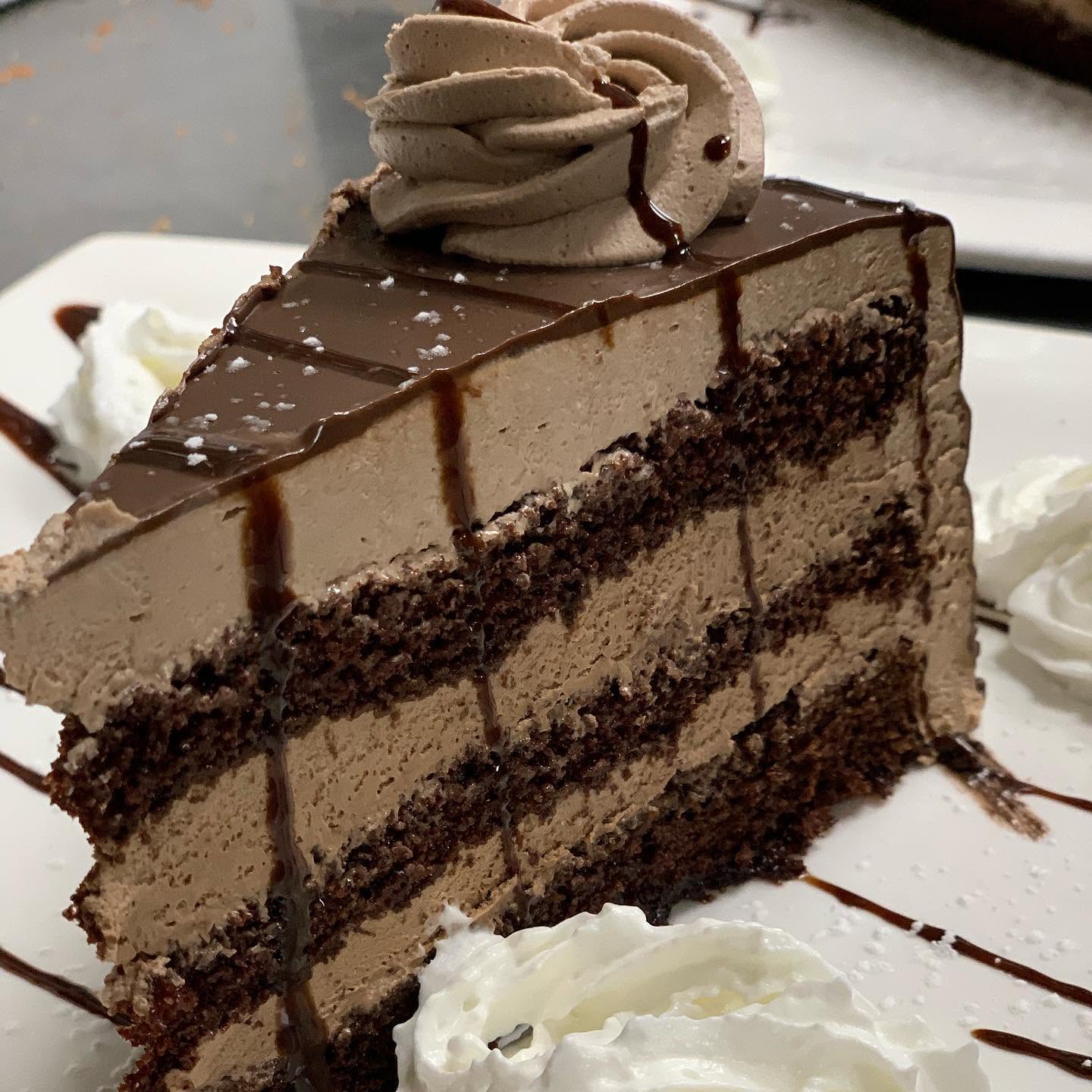 Slice of layered chocolate mousse cake