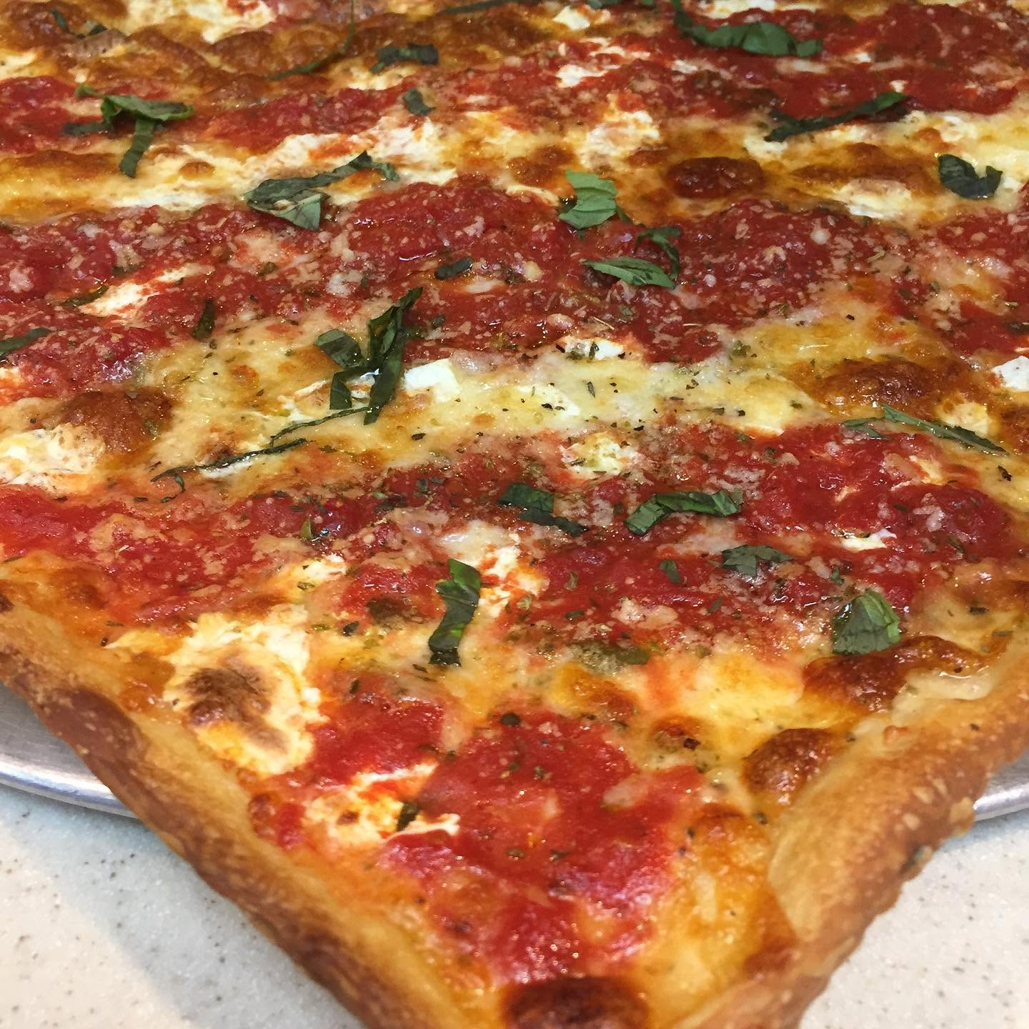 Grandma-style margherita square pizza with tomato