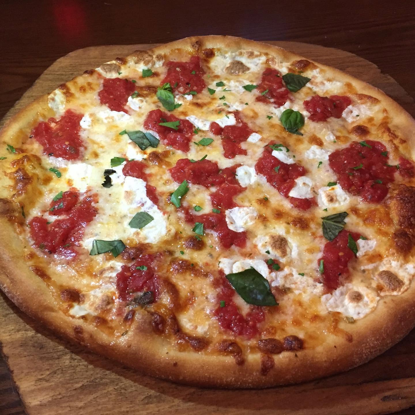 Margherita pizza with fresh mozzarella and basil