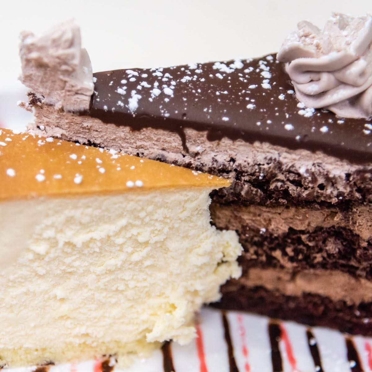 Close-up of a dessert trio with cheesecake
