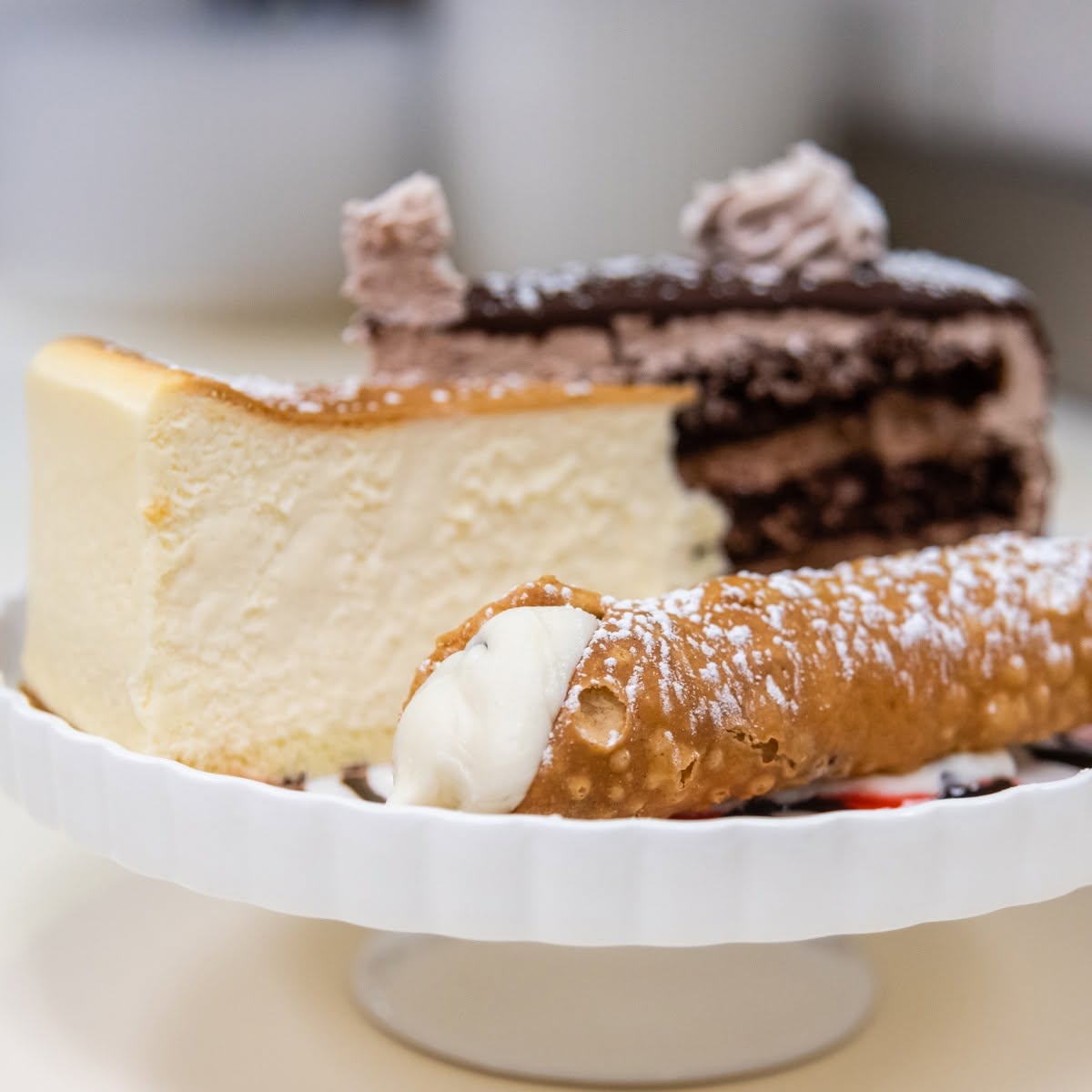 Dessert trio with cheesecake and chocolate cake