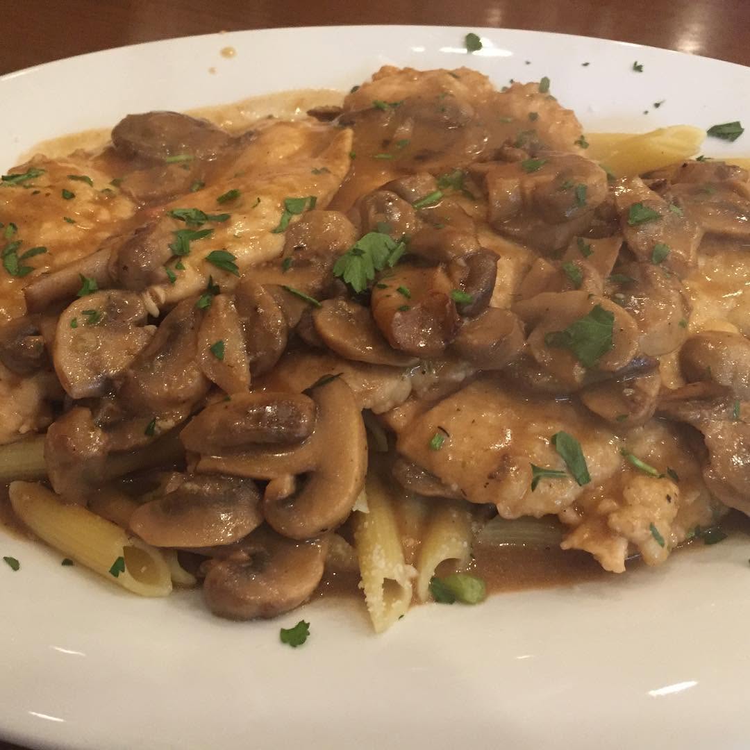 Chicken marsala with mushrooms over penne