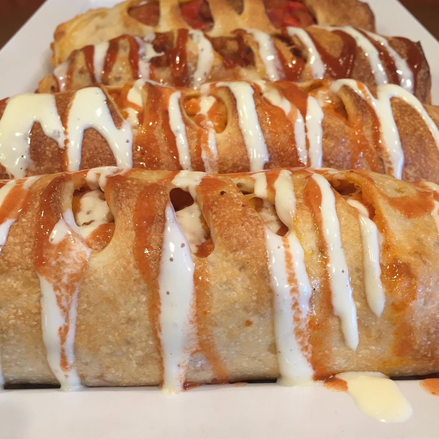 Stuffed pinwheel rolls on a platter