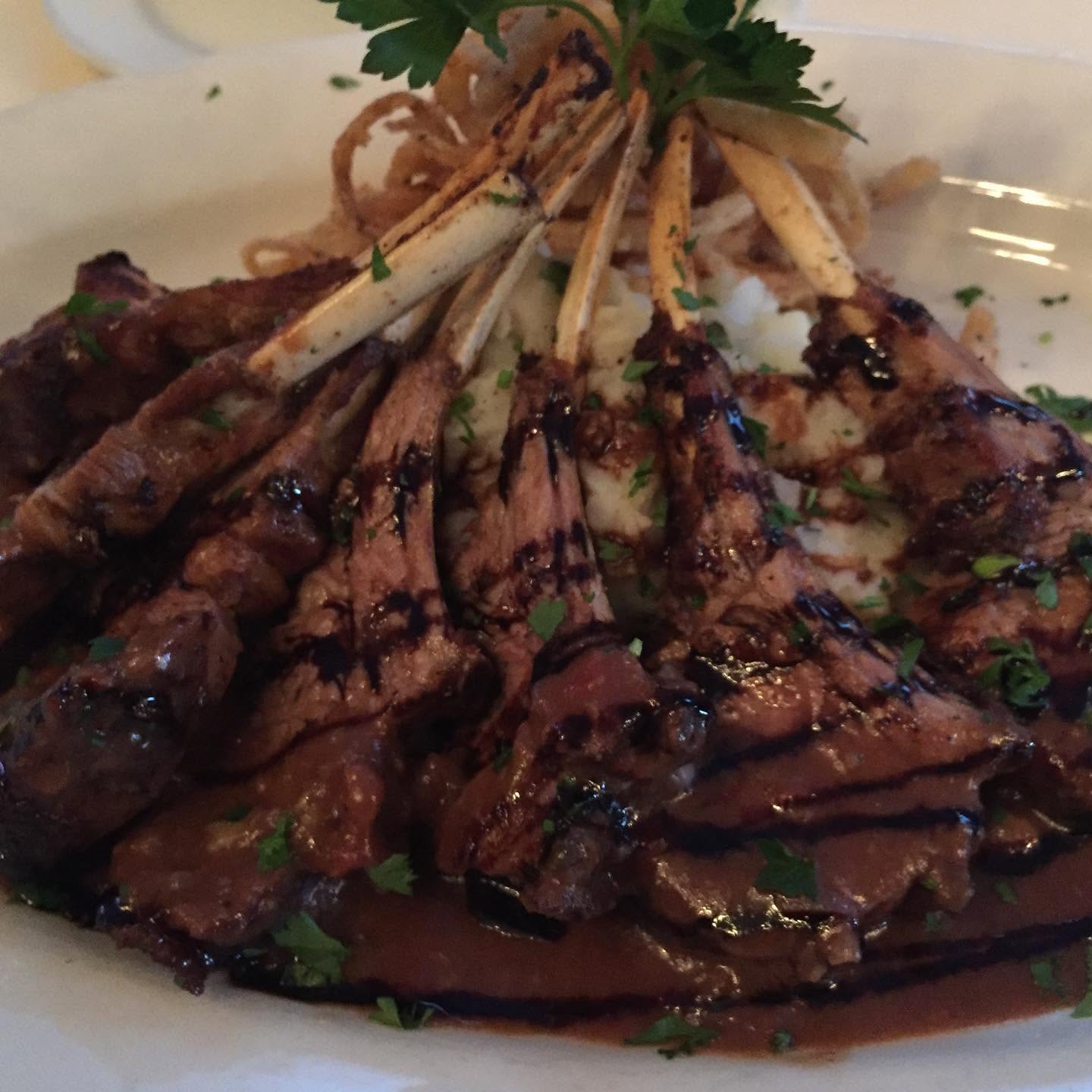 Grilled sliced steak with balsamic drizzle