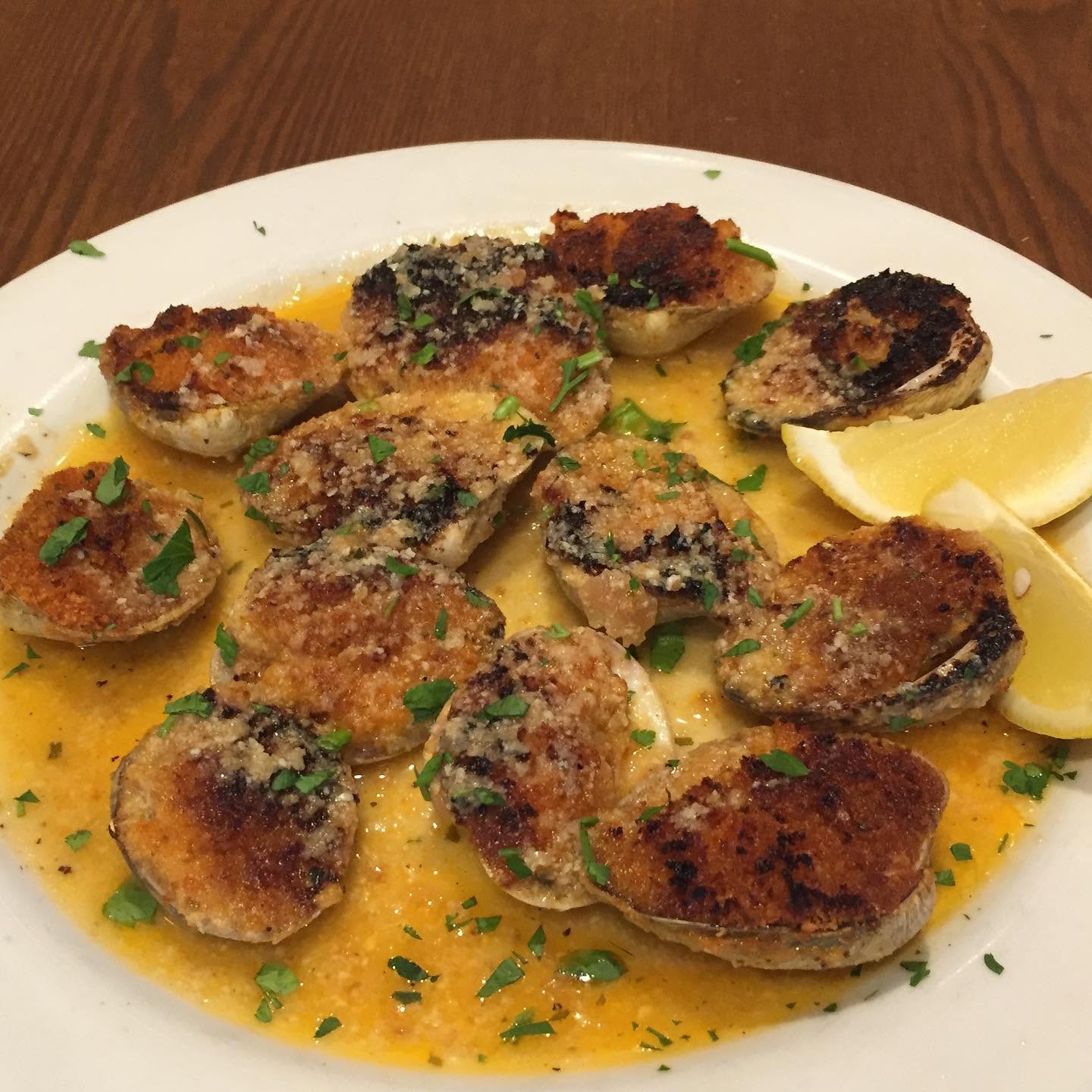 Breaded fried eggplant medallions with lemon