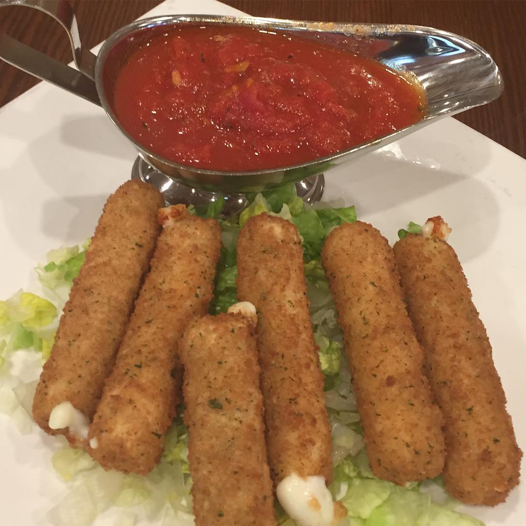 Fried mozzarella sticks with marinara dipping sauce